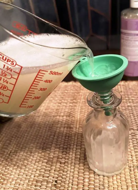 POURING SOAP INTO CONTAINER