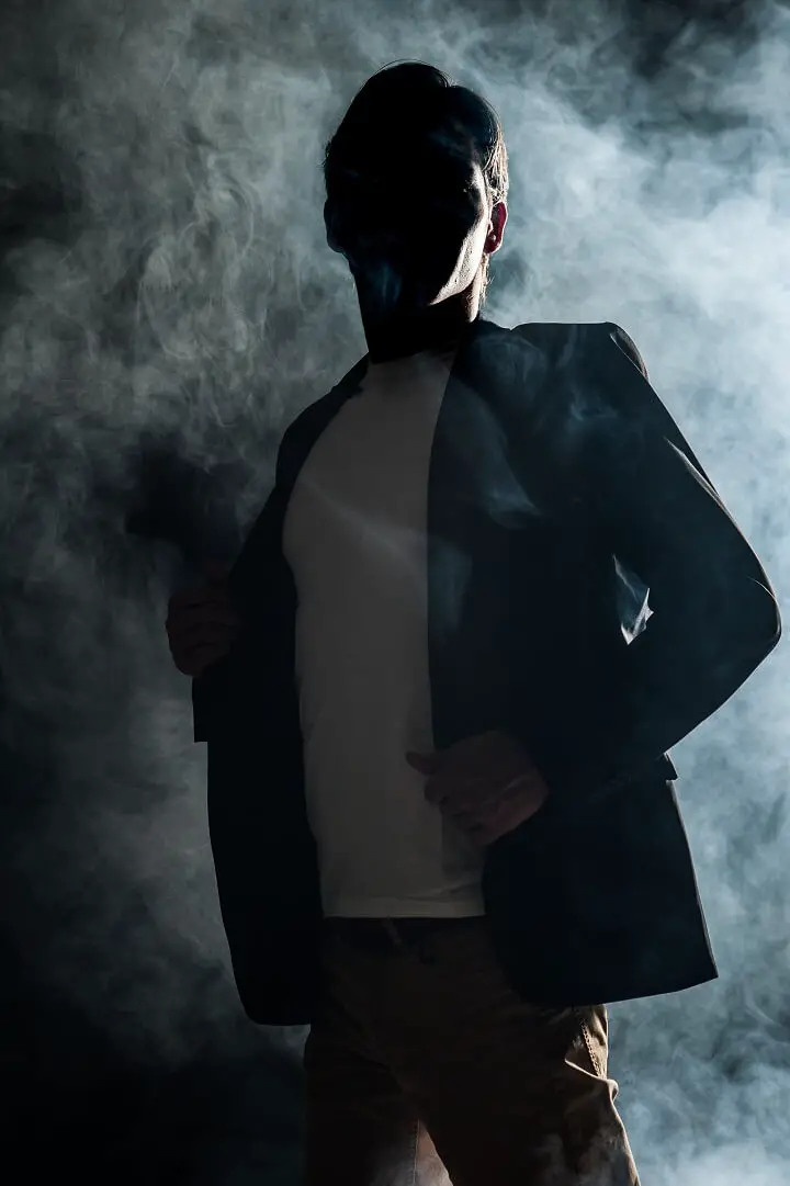 Anonymous Man In Smoky Room