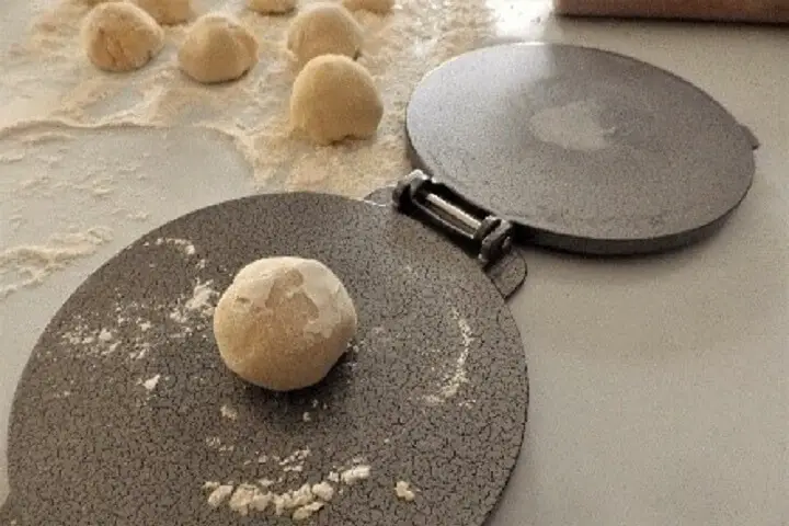 Ball Of Dough On Tortilla Press