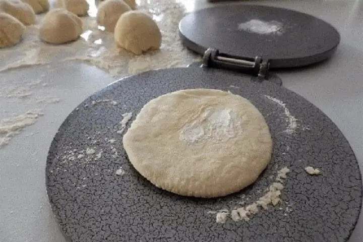 Ball Of Dough Pressed Flat