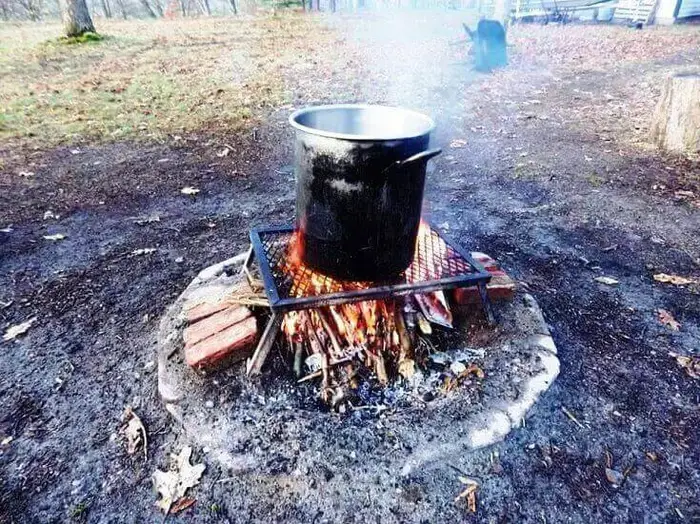 Boiling The Sap Over A Fire