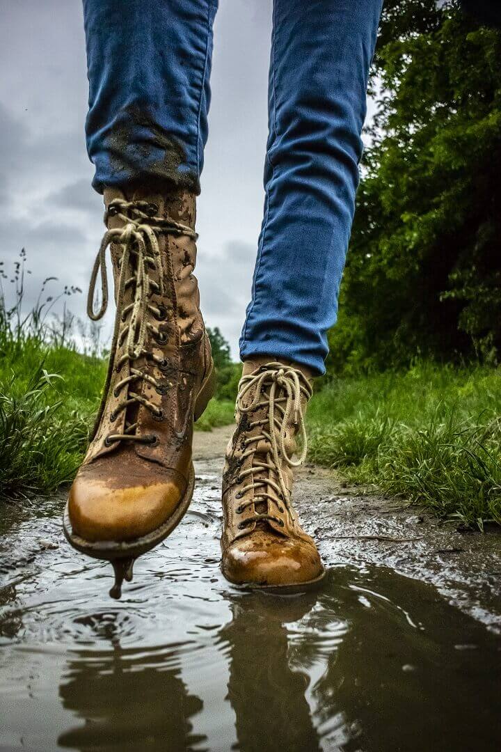 Boots Walking In A Puddle