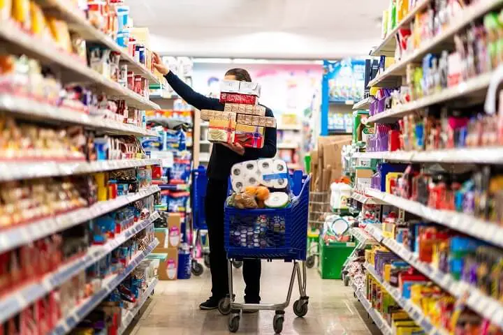 Customer Filling Up Shopping Cart