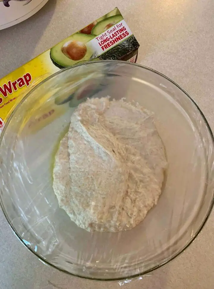 Dough In Bowl Under Plastic Wrap