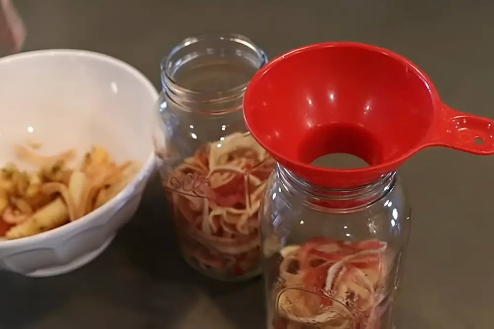 Filling Jar With Scraps