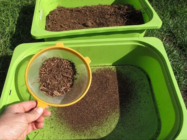 Filtering Soil Through A Sieve