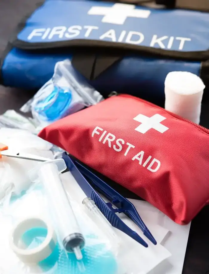First Aid Kits Lying On Table