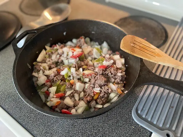 Food Cooking in Cast Iron Skillet