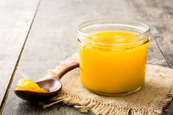 Ghee With Spoon