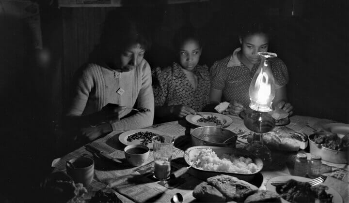 Great Depression Family Eating By Lamplight