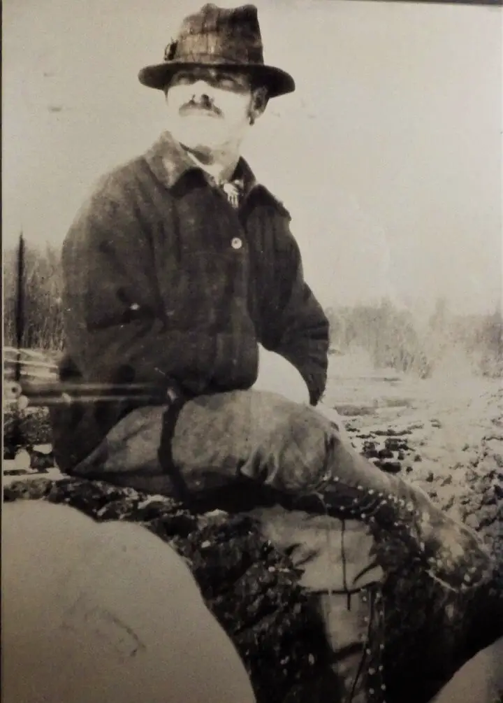 Great Grandpa Sitting on a Log