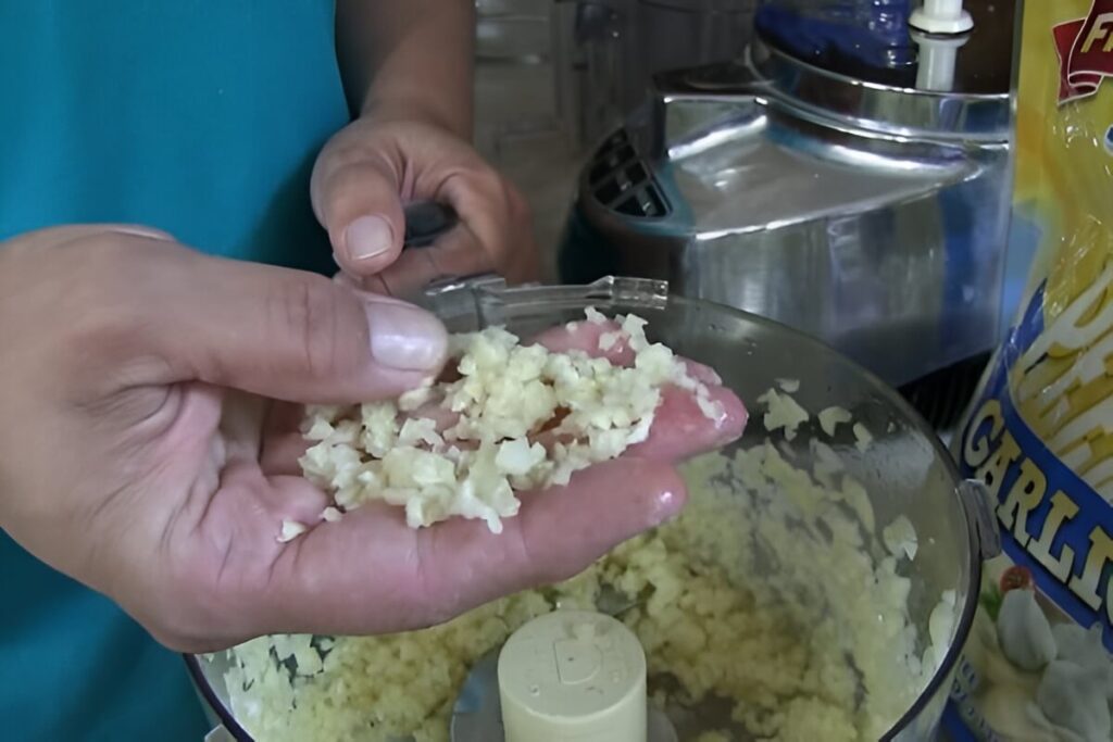 Ground Garlic in Hand