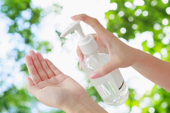 Hand Sanitizer Bottle and Hand