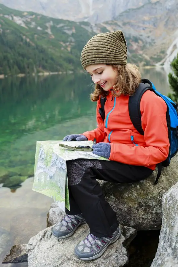 Hiker Girl Reading Map