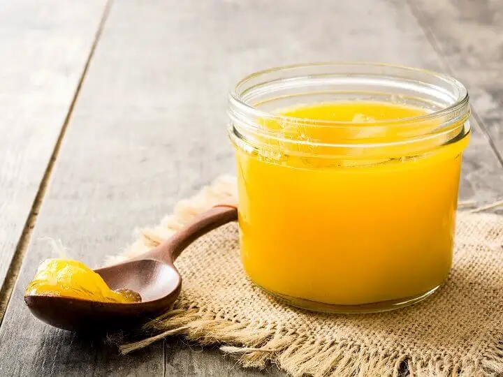 Homemade Ghee in Jar with Spoon