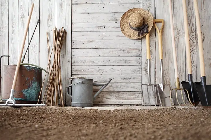 Homestead Tools Leaning Against Barn