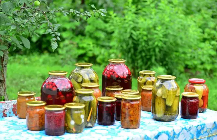 Jars Of Home Canned Vegetables On Table