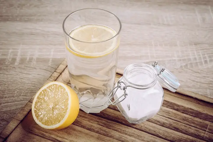 Lemon And Baking Soda In Glass Of Water