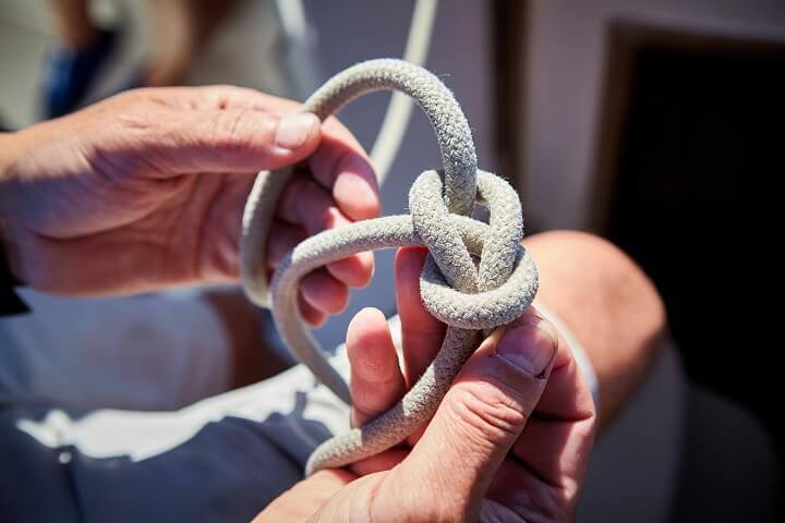 Man Tying a Knot