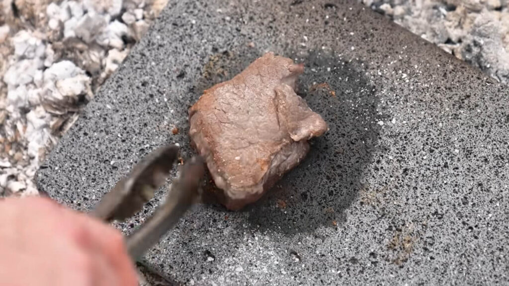 Meat Cooking on Rock