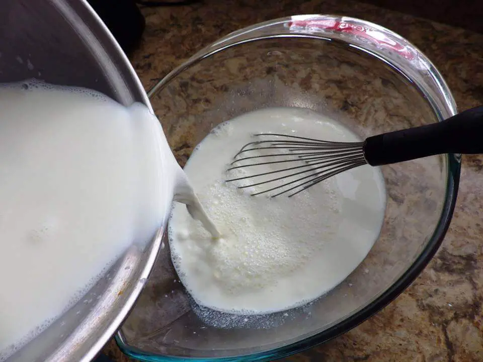 Milk Pouring Into Bowl