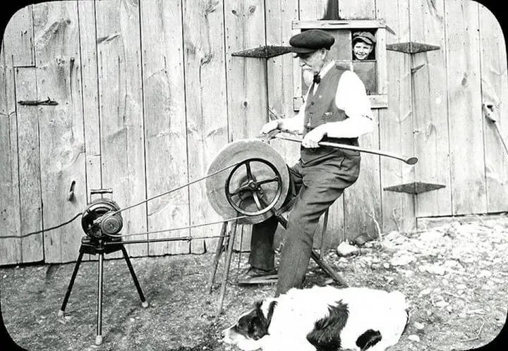 Old Photo of Man Sharpening Tools