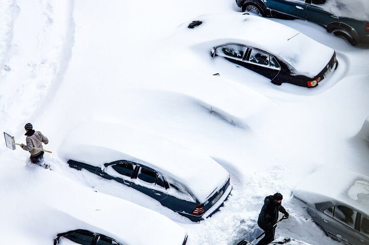 People Digging Cars Out Of Snow