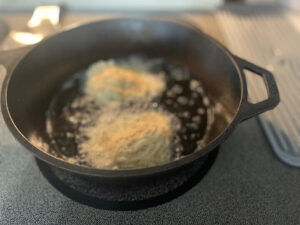 Potato Cakes in Cooking Pan