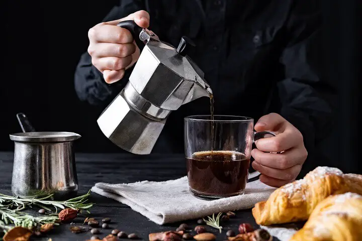 Pouring Coffee from a Percolator