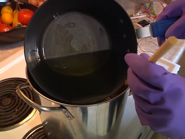 Pouring Oil Into Mixture