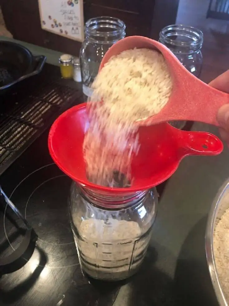 Pouring Rice Into Canning Jar 