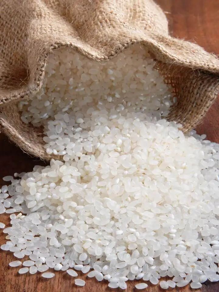 Rice Bag Spilling Onto Table