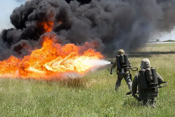 Spraying Field On Fire