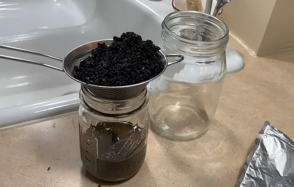 Straining Black Walnuts