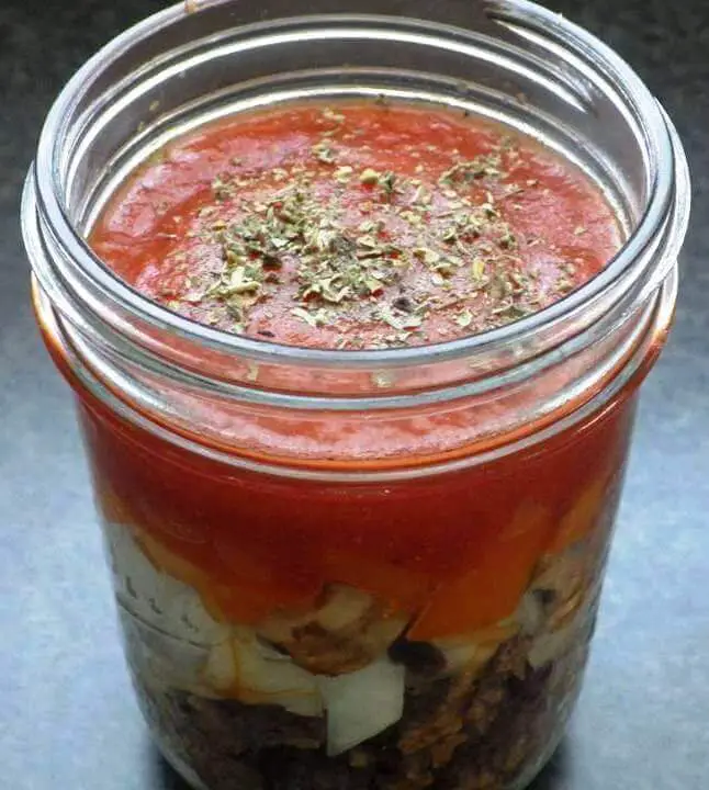 Tomato Sauce on Vegetables and Beef in Jar