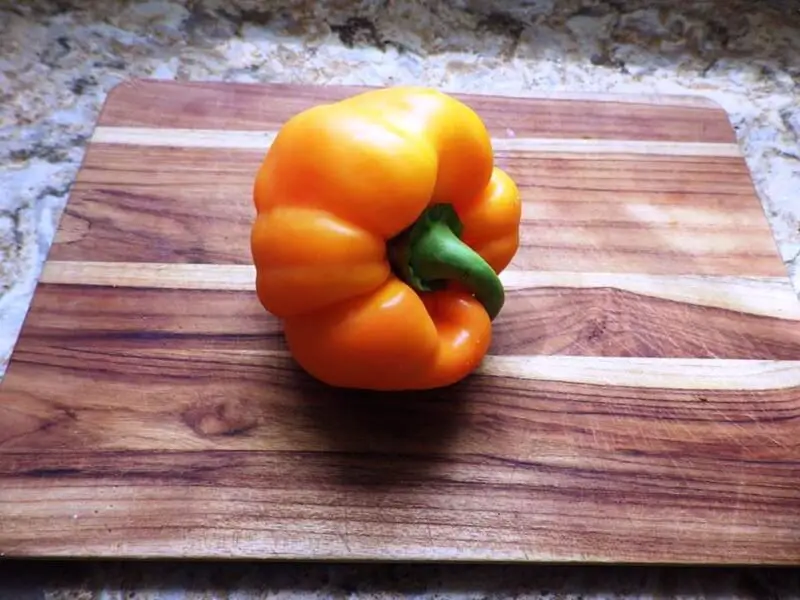 Yellow Pepper on Cutting Board